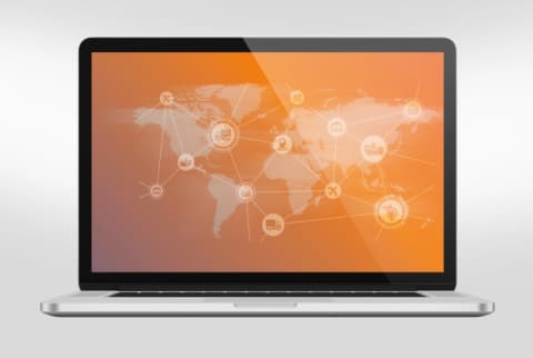 ZVEI-Website auf einem Laptop: Weltkarte in Orange